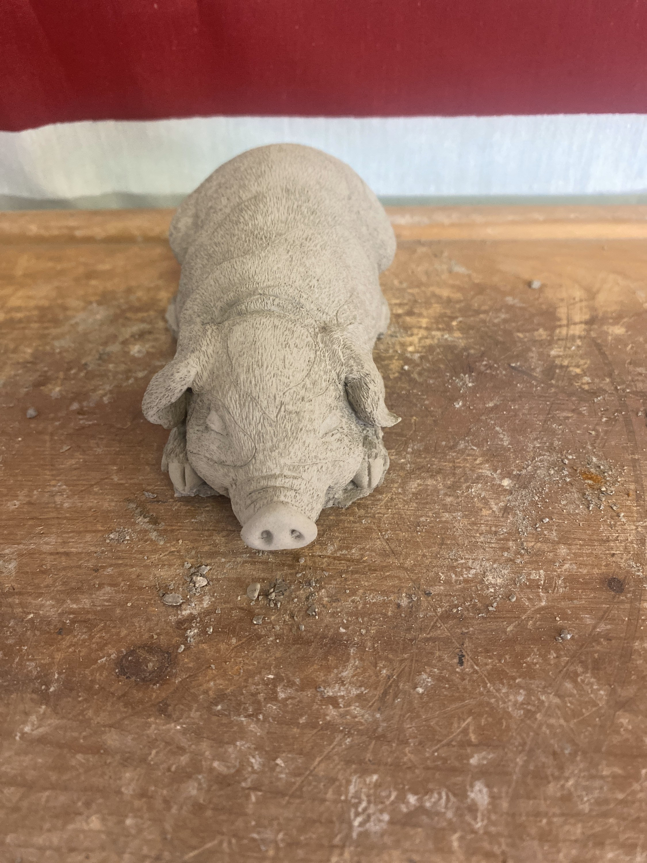 Small pig concrete statue