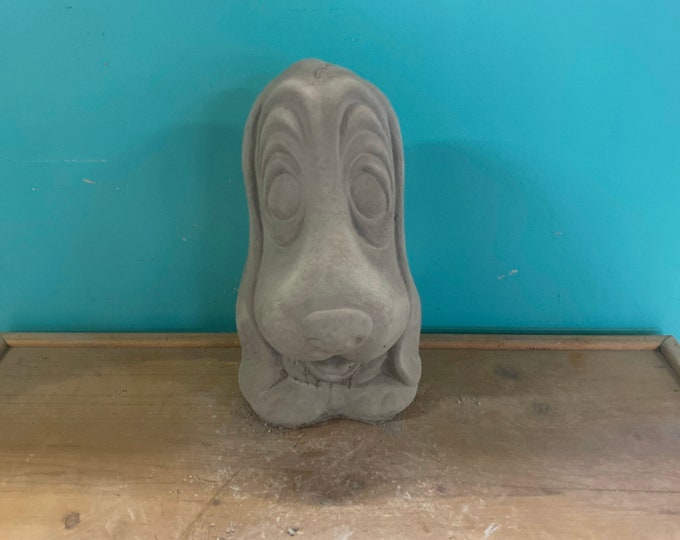 10” bassist hound concrete statue