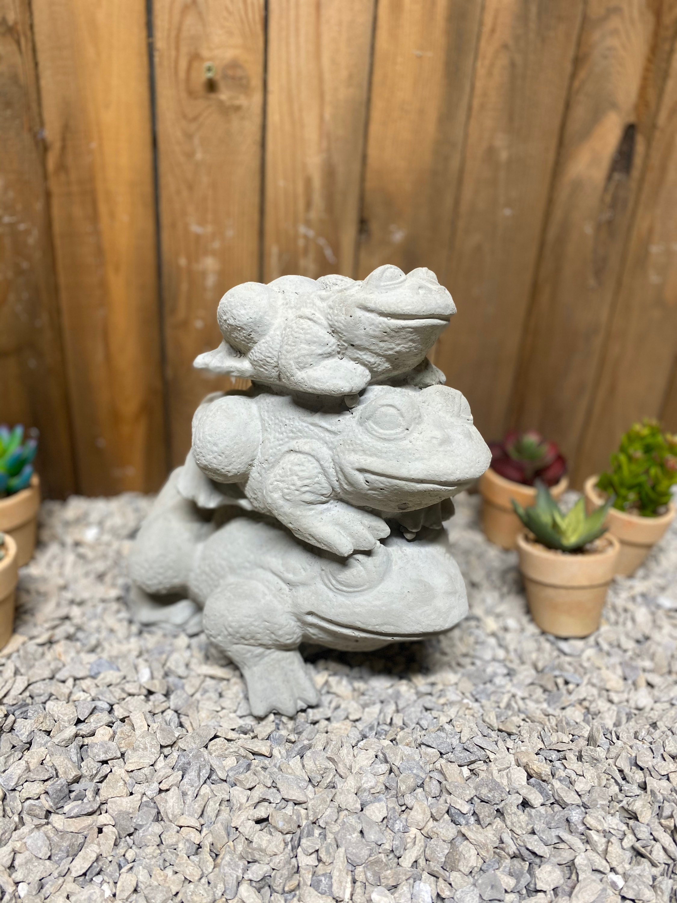 concrete frog statue