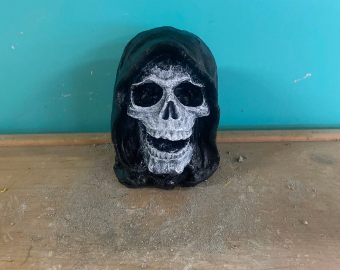 Small painted grim reaper head concrete statue