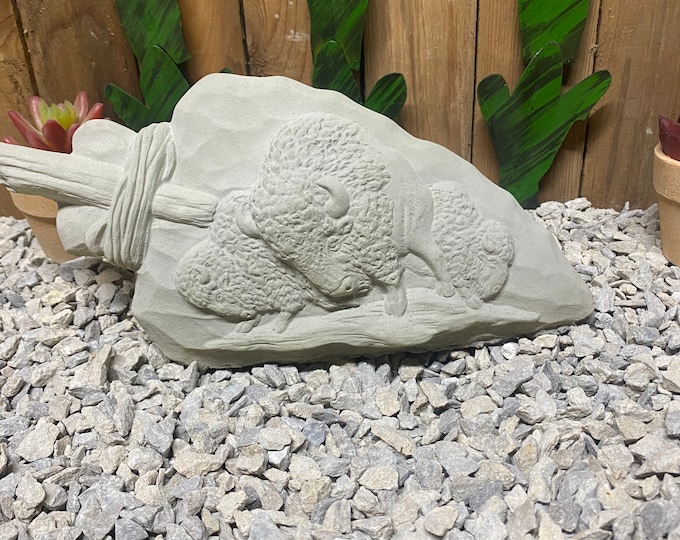 Indian arrowhead with Buffalo concrete statue