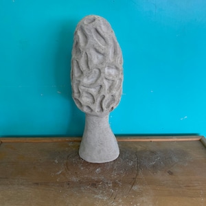 Large morel mushroom concrete statue