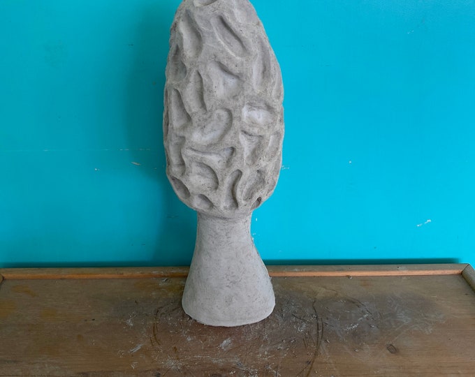 Large morel mushroom concrete statue