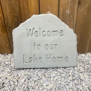 Lake home sign concrete statue