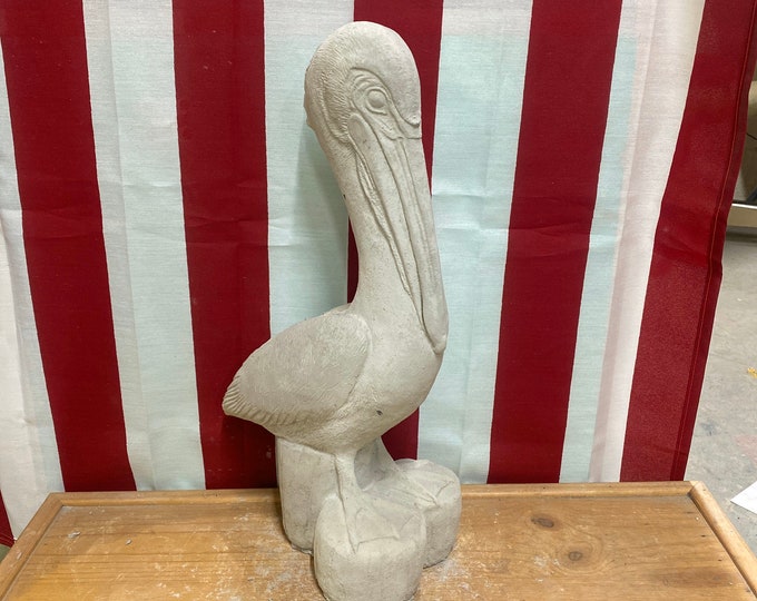 Pelican concrete statue