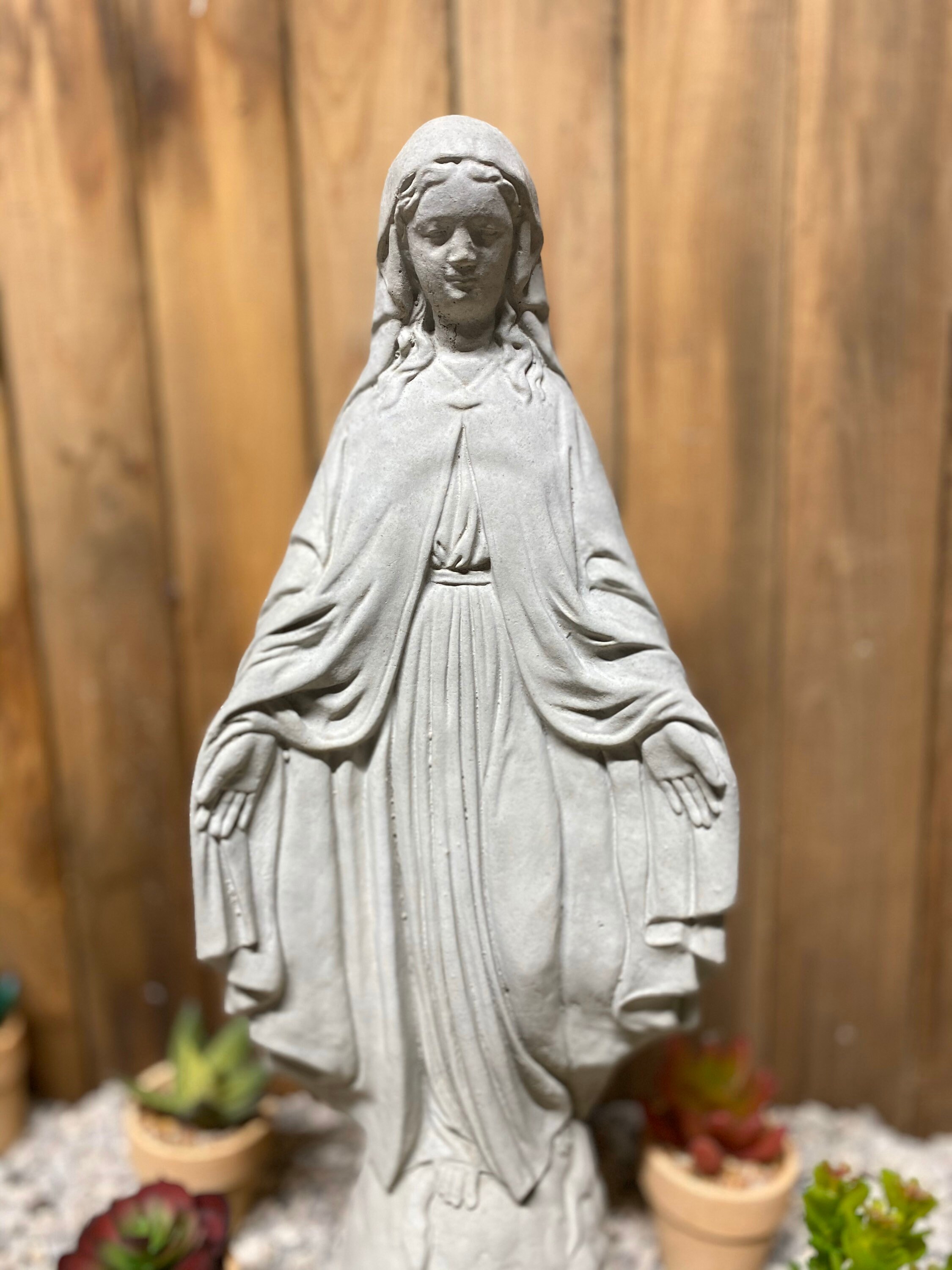concrete statue of mary