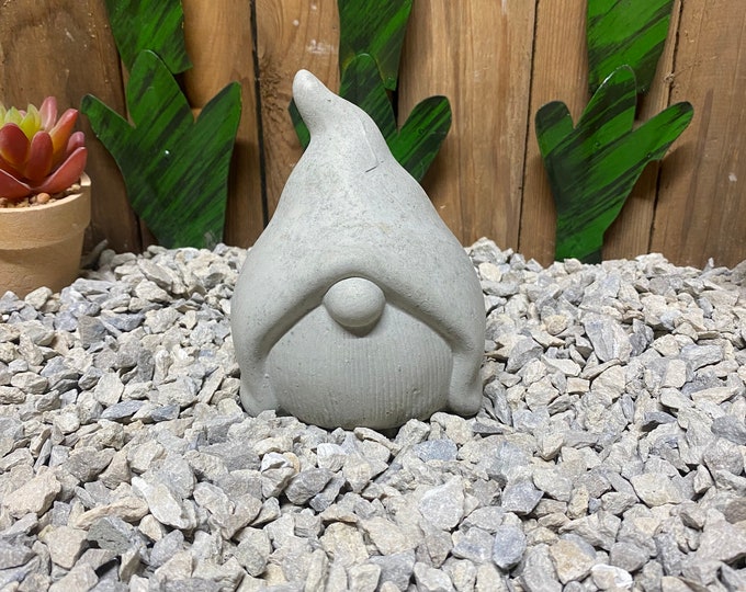 Gnome face concrete statue