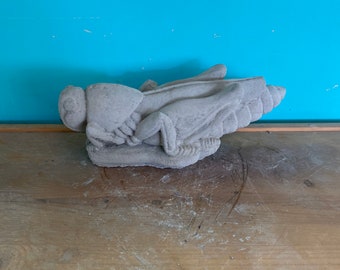 Grasshopper concrete statue