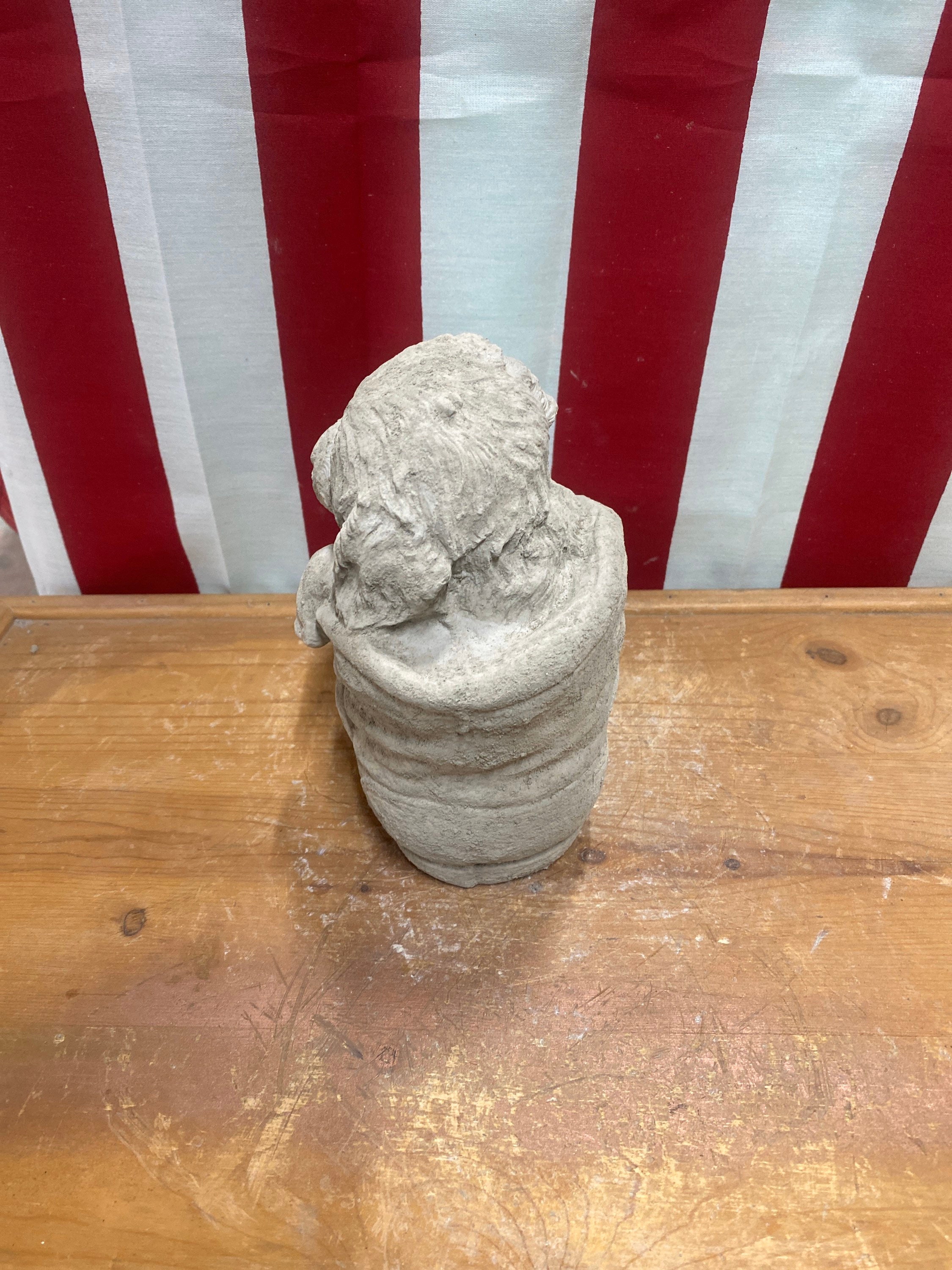 Dog puppy in boot Concrete statue