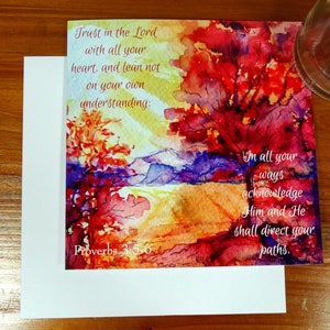 May include: Watercolour painting of a landscape with trees, mountains, and a river. The painting features a quote from Proverbs 3:5-6: "Trust in the Lord with all your heart, and lean not on your own understanding: In all your ways acknowledge Him and He shall direct your paths."