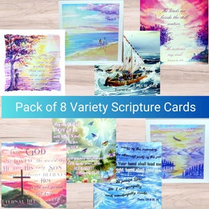 May include: A pack of eight scripture cards with watercolour illustrations. The cards feature images of landscapes, boats, and inspirational quotes from the Bible. The text "Pack of 8 Variety Scripture Cards" is displayed in the image.