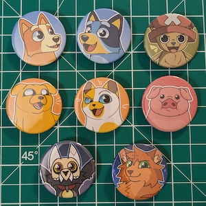 Fandom-knappmärken (Adventure Time, Bluey, Gravity Falls)