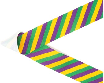 May include: Purple, green, and yellow striped ribbon. The ribbon is folded in half, creating a V-shape.