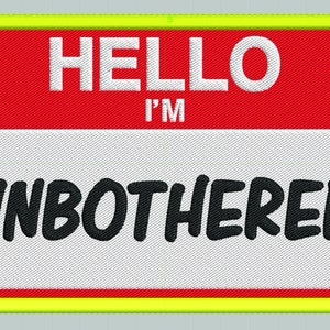 May include: A red and yellow name tag with the text "HELLO I'M UNBOTHERED" in white and black lettering.