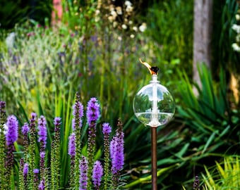 Live demonstration: Artist uses torch to blow glass flower 