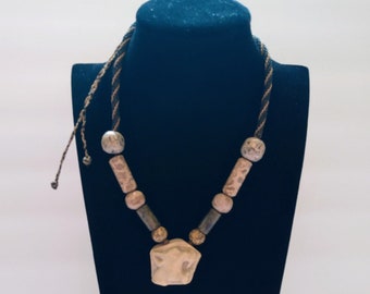 Aztec jaguar necklace indigenous jewelry.