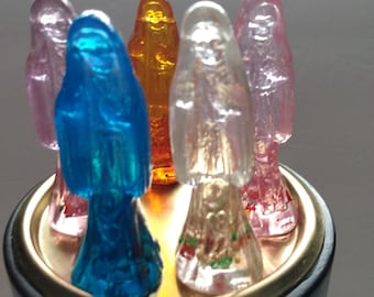 Translucent holy death Santa Muerte statue prepared