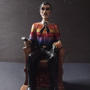Jesus Malverde vorbereitete Statue sitzend