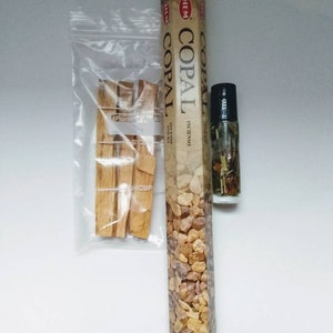 Santa Muerte altar bundle contains 3 Palo Santo sticks, copal incense & Santa Muerte altar oil