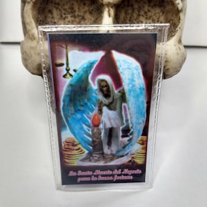 Laminated Santa Muerte prayer card. La Santa Muerte del negocio para la Buena fortuna