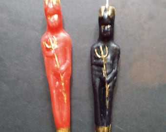 Lucifer infernal red and black figure candles for offering or ritual s .