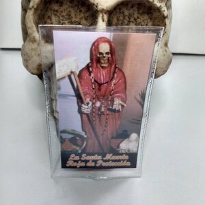 ラミネート加工されたサンタ ムエルテの祈りカード。ラ・サンタ・ムエルテ・ロハ・デ・プロテクション