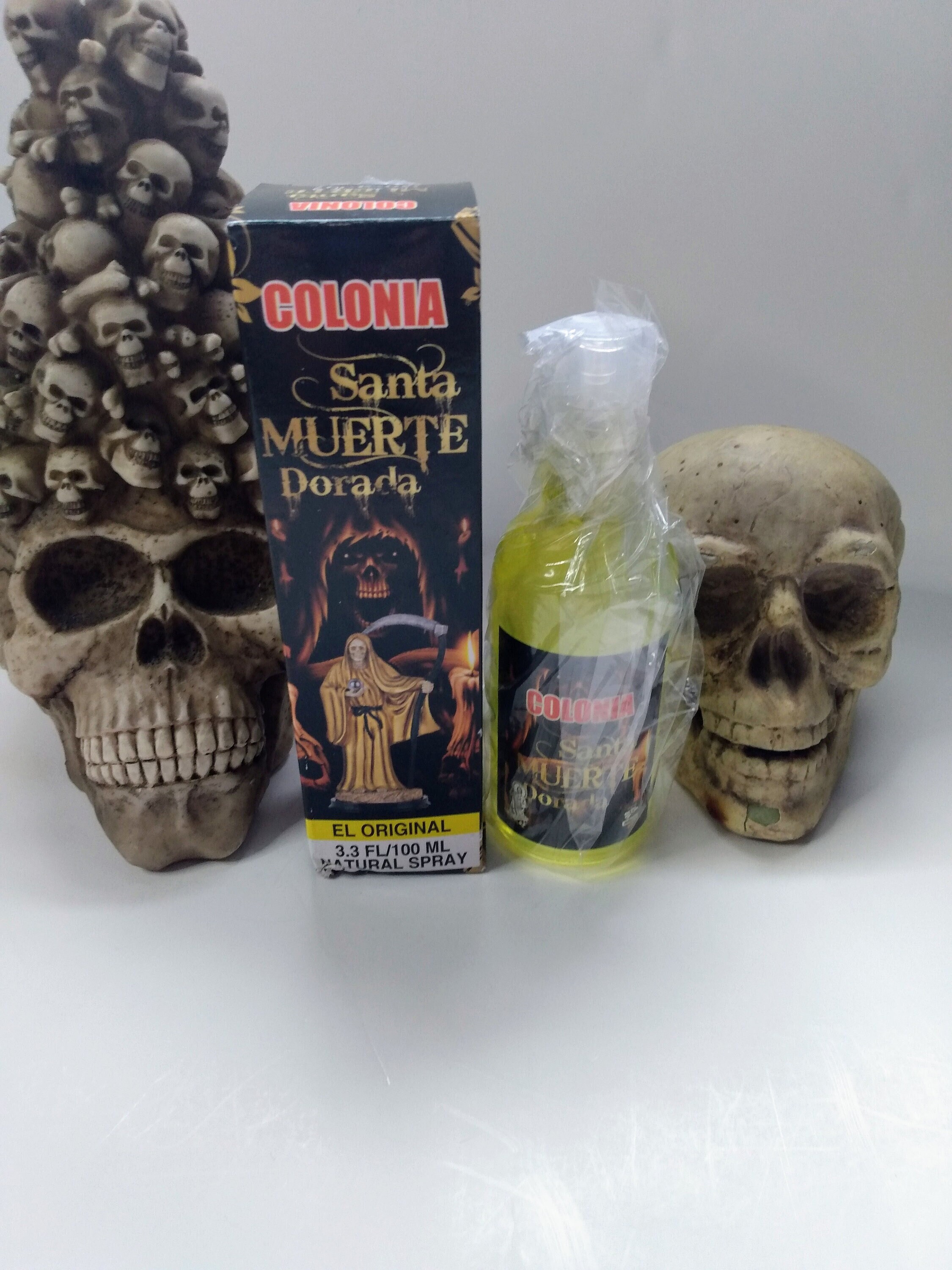 Santa Muerte Holy death Gold abundance wealth spray/perfume.