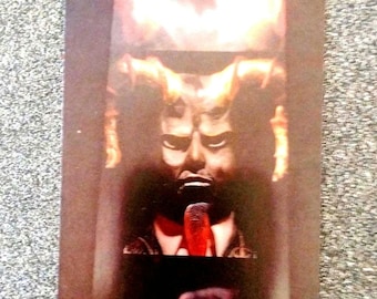 May include: A dark, rectangular image featuring a stylized depiction of a person with horns, a red tie, and a microphone. The artwork has a dramatic, shadowy aesthetic with a focus on the central figure's face.