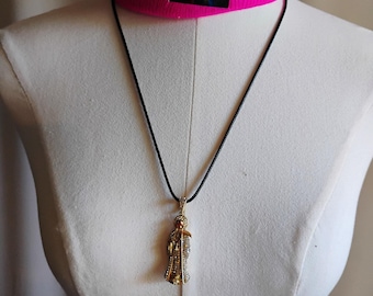 Santa muerte gold and silver pendant charm necklace.