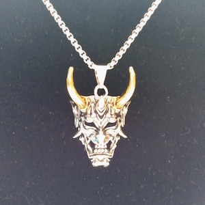 Silver and gold devil Satan necklace