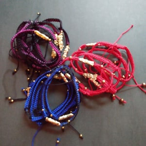 Santa muerte adjustable bracelets: blue/black,  purple/black, red