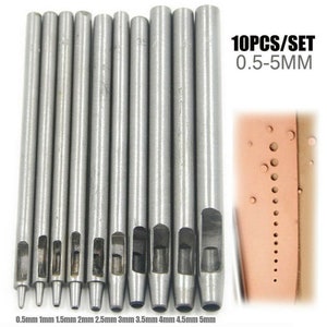 May include: Set of 10 silver metal leather hole punches, ranging in size from 0.5 mm to 5 mm. The punches are arranged in order of size, with the smallest on the left and the largest on the right. The image also shows a piece of leather with holes punched in it, demonstrating the use of the punches.