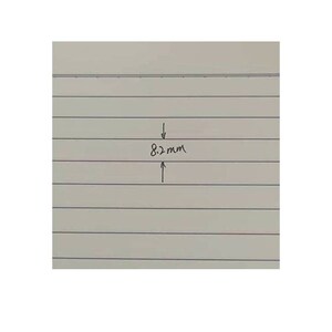 May include: A handwritten measurement of 8.2 mm on lined paper.
