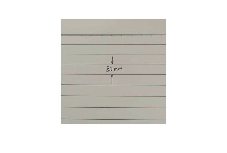 May include: A handwritten measurement of 8.2 mm on lined paper.
