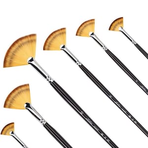 May include: Set of five fan-shaped paint brushes with black handles and gold bristles. The brushes are arranged in a diagonal line, with the largest brush at the top and the smallest brush at the bottom.