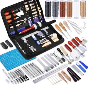 May include: A leather craft tool kit with a black carrying case, a blue cutting mat, and a variety of tools including awls, punches, stitching tools, and a ruler. The kit also includes six spools of waxed thread in black, gray, brown, tan, and white.
