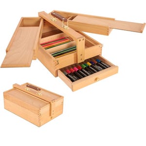 May include: A wooden art supply box with a handle, a drawer, and a lid that opens to reveal compartments for storing pencils and markers. The box is made of light wood and has a natural finish.