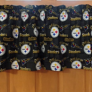 May include: Black and gold valance with a repeating pattern of the Pittsburgh Steelers logo and the words "Pittsburgh Steelers".