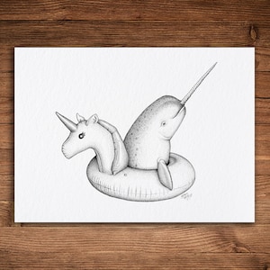 May include: A black and white illustration of a narwhal riding an inflatable unicorn pool float. The narwhal has a long, pointed horn and a small, round eye. The unicorn float has a horn, a mane, and a tail.