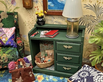 miniature distressed green cupboard in 1:12 scale