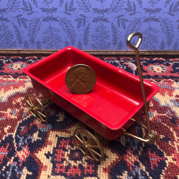 miniature red metal kid's wagon in 1:12 scale