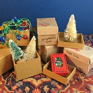 kit of 8 miniature cardboard storage banker boxes in 1:12 scale
