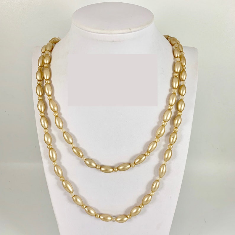 Very long vintage continuous pearlised glass bead necklace