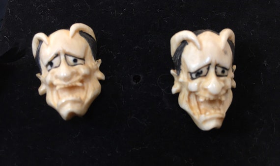 Devil Cufflinks in white