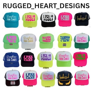 May include: A collection of trucker hats in various colors, each featuring unique text designs. The hats display phrases like "Sunshine & Tan Lines," "I Pee in Pools," and "Sunbisked." The hats have mesh backs and curved brims.