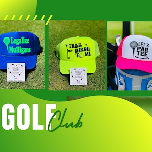 May include: Three golf-themed trucker hats. One is blue with "Legalize Mulligans" in green. Another is neon yellow with "Talk Birdie To Me" in black. The third is pink and white with "Let's Par Tee" in black. All have a mesh back.