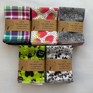 10 reusable flannel napkins in shades of gray, pink and gray, plaids or brights.