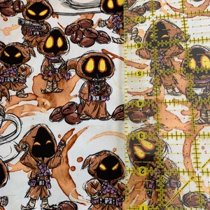 May include: White fabric with a repeating pattern of brown hooded figures holding coffee cups and coffee beans. The background is a light brown color with coffee stains.