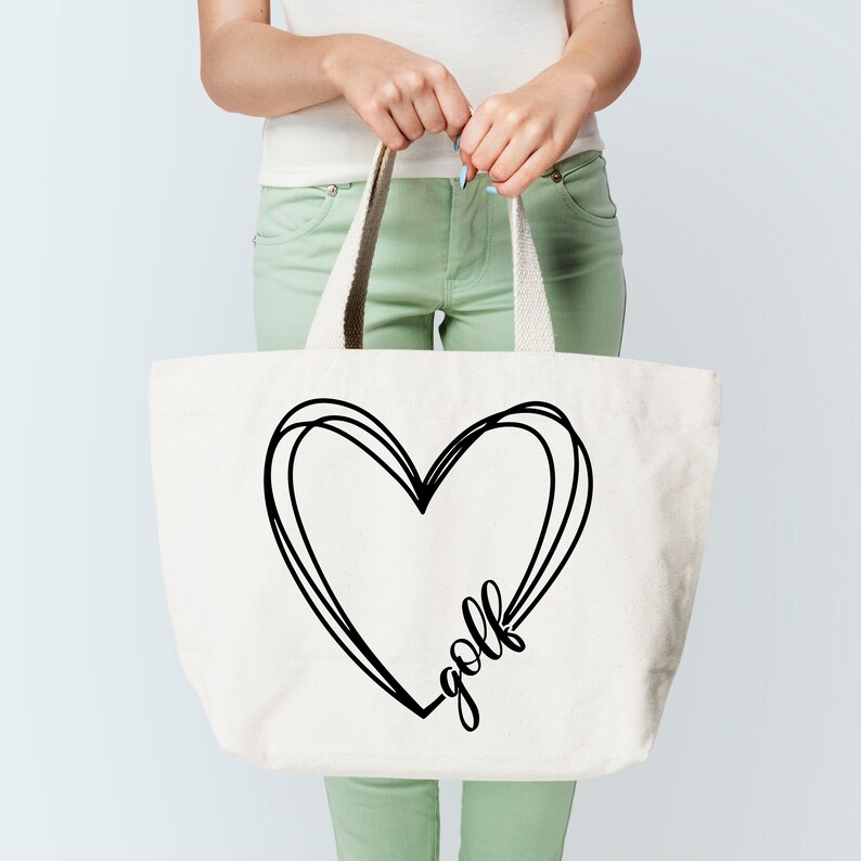 May include: A white canvas tote bag with black handles and a black graphic of a heart with the word "golf" inside.