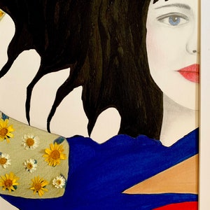 May include: A painting of a woman with long black hair, wearing a blue and red dress with a beige triangle. The dress is decorated with white and yellow flowers. The woman's blue eye is visible.